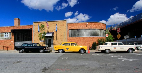 Standard tax sandwiched between 2 limos